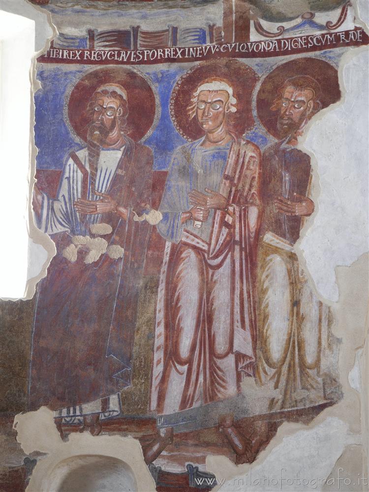 Carpignano Sesia (Novara, Italy) - Three of the apostles depicted on the wall of the central apse of the church of San Pietro